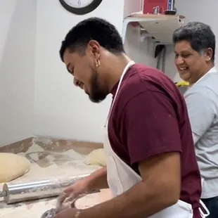 two men in a kitchen