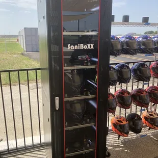 LONE STAR KART PARK has added State Of The Art Germ/COVID Killing Science Technology to their Helmets and Hood Socks SANIBOXX
