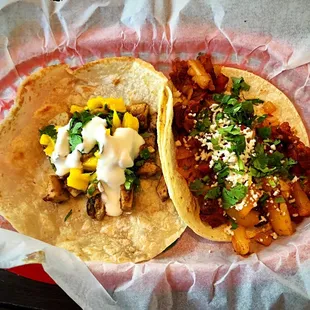 Hawaiian chicken (left) and al pastor. So good. You have to get the homemade flour tortillas.