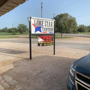 a sign for lone star tavern