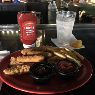 Appetizer Trio w/Chicken Strips, Fries, Mozzarella Sticks, Marinara Sauce, BBQ Sauce, and Ketchup