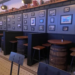 a row of tables and stools