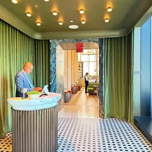 a man standing at a counter