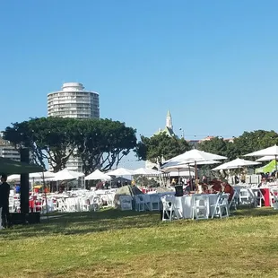 tables and umbrellas in a park