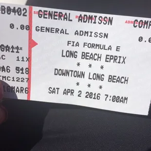 a person holding a ticket