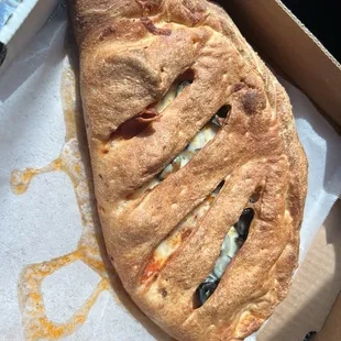 Pepperoni, cheese and olive Calzone --not a fan of the grease.
