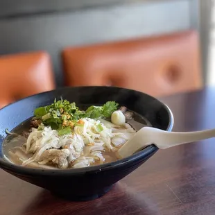 Thai boat noodle with big flat noodle, clear broth doesn't taste anything like boat noodle