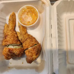 chicken wings in a styrofoam container