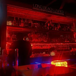 a bar with red and blue lights