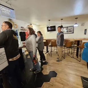 a group of people standing in a room