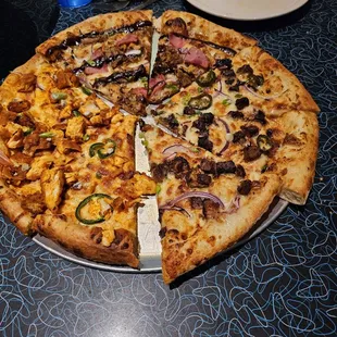 This is three different pizzas. Starting at the top going clockwise. Smokehouse BBQ, Risk it for the Brisket, and Buffalo Chicken!