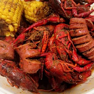 The Shorewolf boil - Crawfish, corn, sausage "link", potato. Lemon pepper n garlic seasoning medium heat.