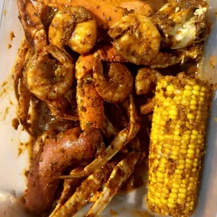 Crab legs, shrimp, corn. Medium heat. Lemon n garlic seasoning.