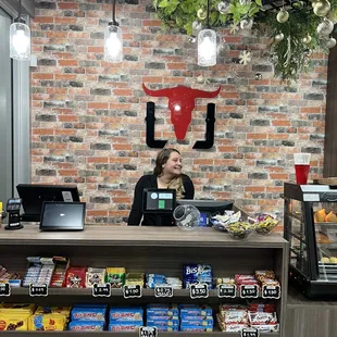 a woman behind the counter