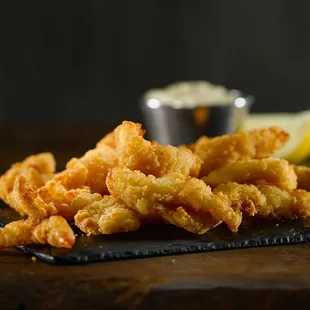 a pile of fried onion rings