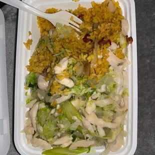 a plate of food with rice and vegetables