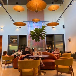 a group of people sitting around a table