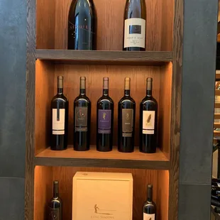 bottles of wine on a shelf