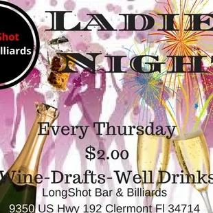 two glasses of wine and a bottle of champagne