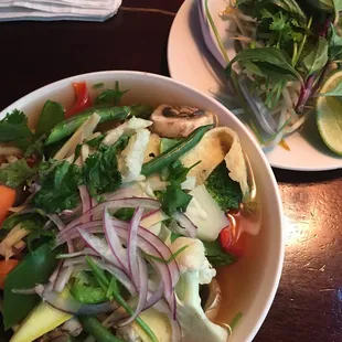 My favorite veggie/tofu Pho bowl, with fresh basil, sprouts and lime. Overflowing!