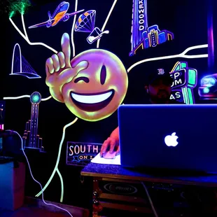 a laptop with a smiley face on it