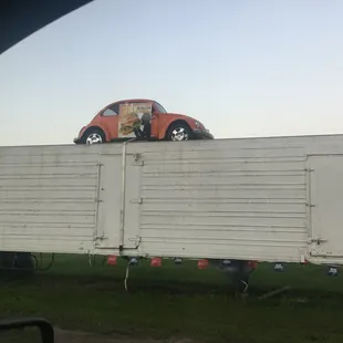 a car on top of a truck