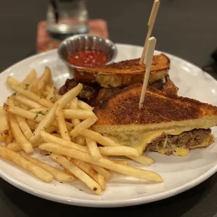 Grilled cheese with burger and bacon