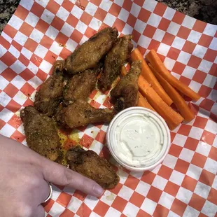 My pinky compared to these embarrassing of wings they are handing out.