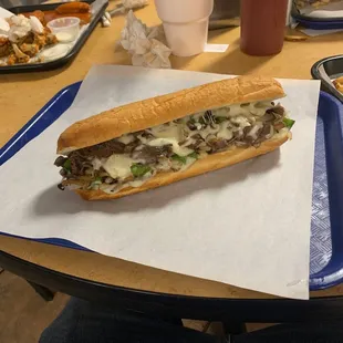 a sub sandwich on a tray