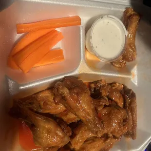 12 piece honey hot wings with carrots and ranch included.