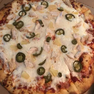 Grilled chicken, pineapple, and jalapeño pizza