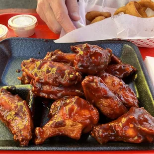 a plate of chicken wings