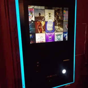 Cool, wall-mounted digital juke box for those nights without a concert. Just inside main entrance.
