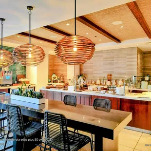 Included. Daily continental breakfast &amp; evening live action stations plus more. Longboard Club. 'Alohilani Resort Waikīkī Beach.