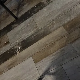 Pieces of the ceiling all over the floor, some chunks a few inches across.