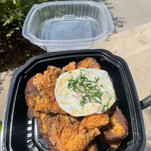 French Toast Chicken Stack, french toast, hand-breaded chicken, sausage gravy, over easy egg.