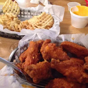 chicken and waffles on a table