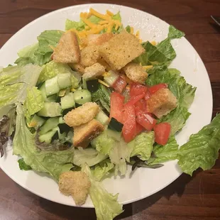 The nice delicious salad that was prepared with my meal. I got the champagne vinaigrette dressing so delicious.