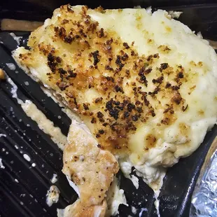 Parmesam chicken two large pieces, I ate one and saved the other piece for lunch, seasoned well, and tasted good.