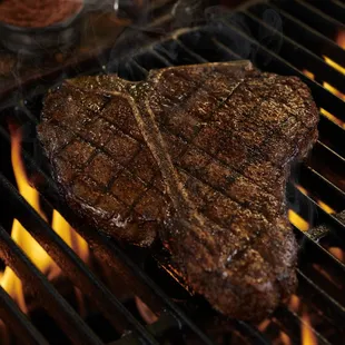 Got the biggest steak in the game wearing our name! The LongHorn porterhouse combines a bone-in strip and tender filet in one thick cut.