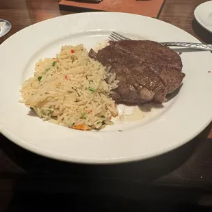 Flo's Filet 9oz with a side of rice