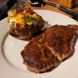 Rib eye, loaded baked potatoe