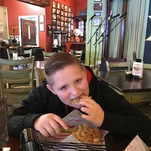 Enjoying his sandwich