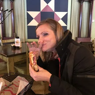 Enjoying her sandwich
