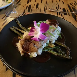 Feature- Grilled Duck with green pea Risotto, blackberry Demi glaze and Grilled Asparagus.