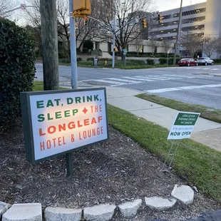 a sign on the corner of a street