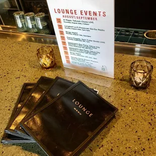 menus and drinks on the counter