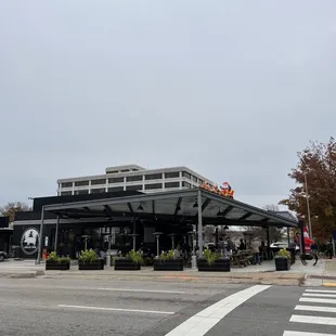 Outside. Lots of outdoor covered seating with heaters