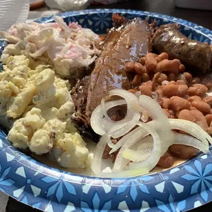 Brisket plate with yummy brisket sausage, coleslaw, pinto beans and potato salad