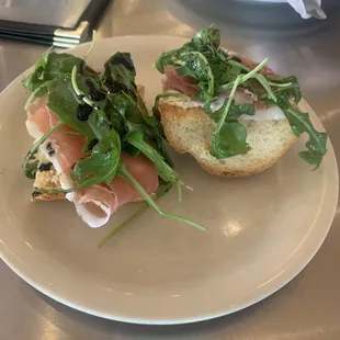 Starter course prosciutto + whipped ricotta + arugula + balsamic